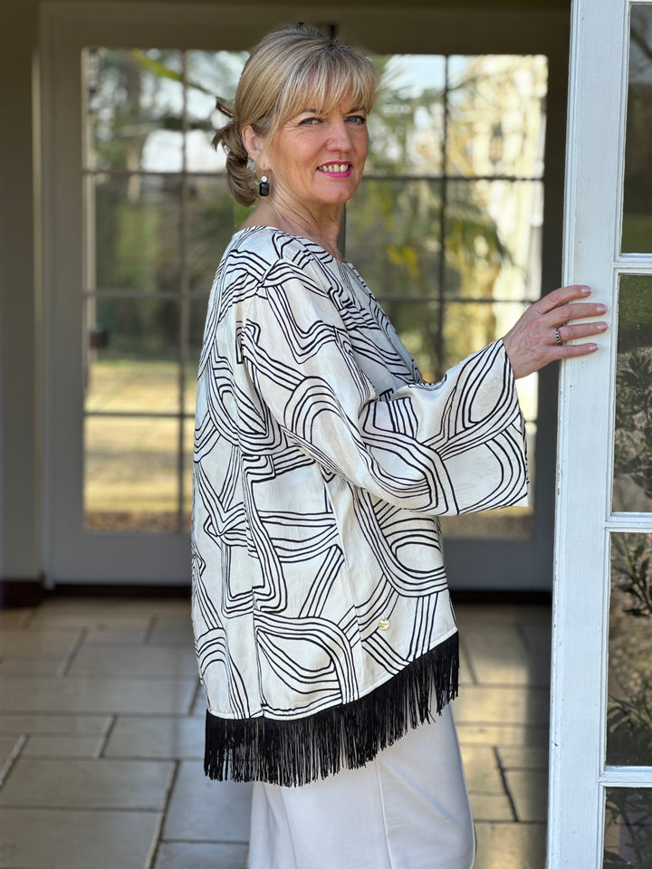 Flared Sleeve Abstract Top With Tassel Trim - Malissa J | Cream & Black