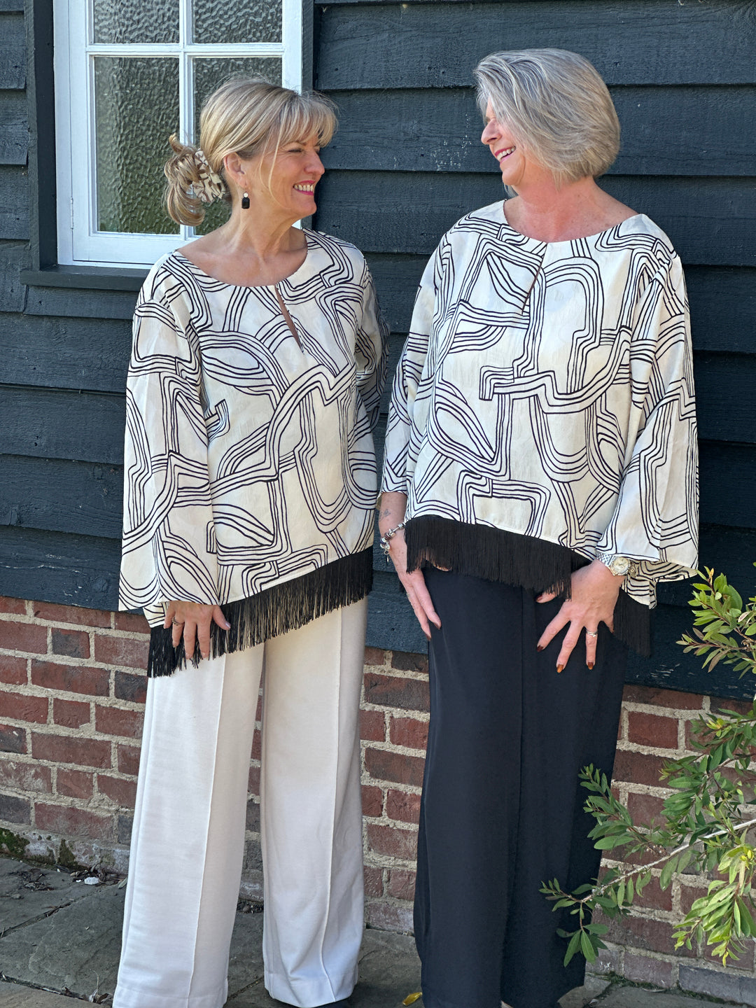 Flared Sleeve Abstract Top With Tassel Trim - Malissa J | Cream & Black