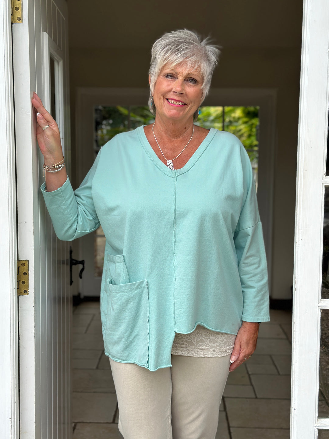 Double Pocket Asymmetric Hem Sweatshirt | Mint