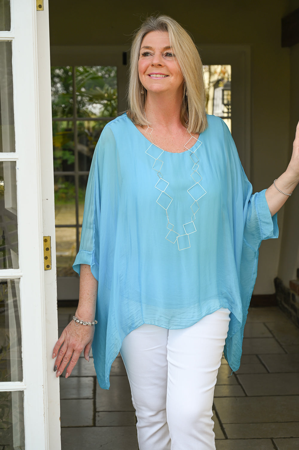 aqua silk blouse