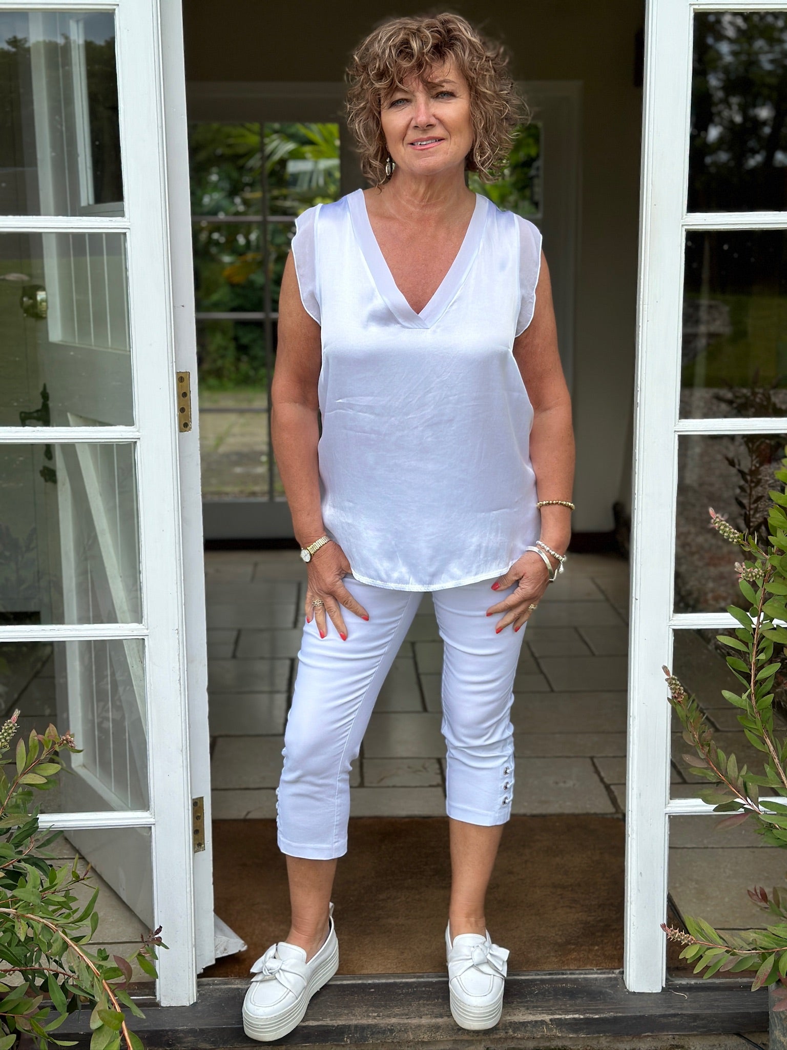 Off white sleeveless blouse online